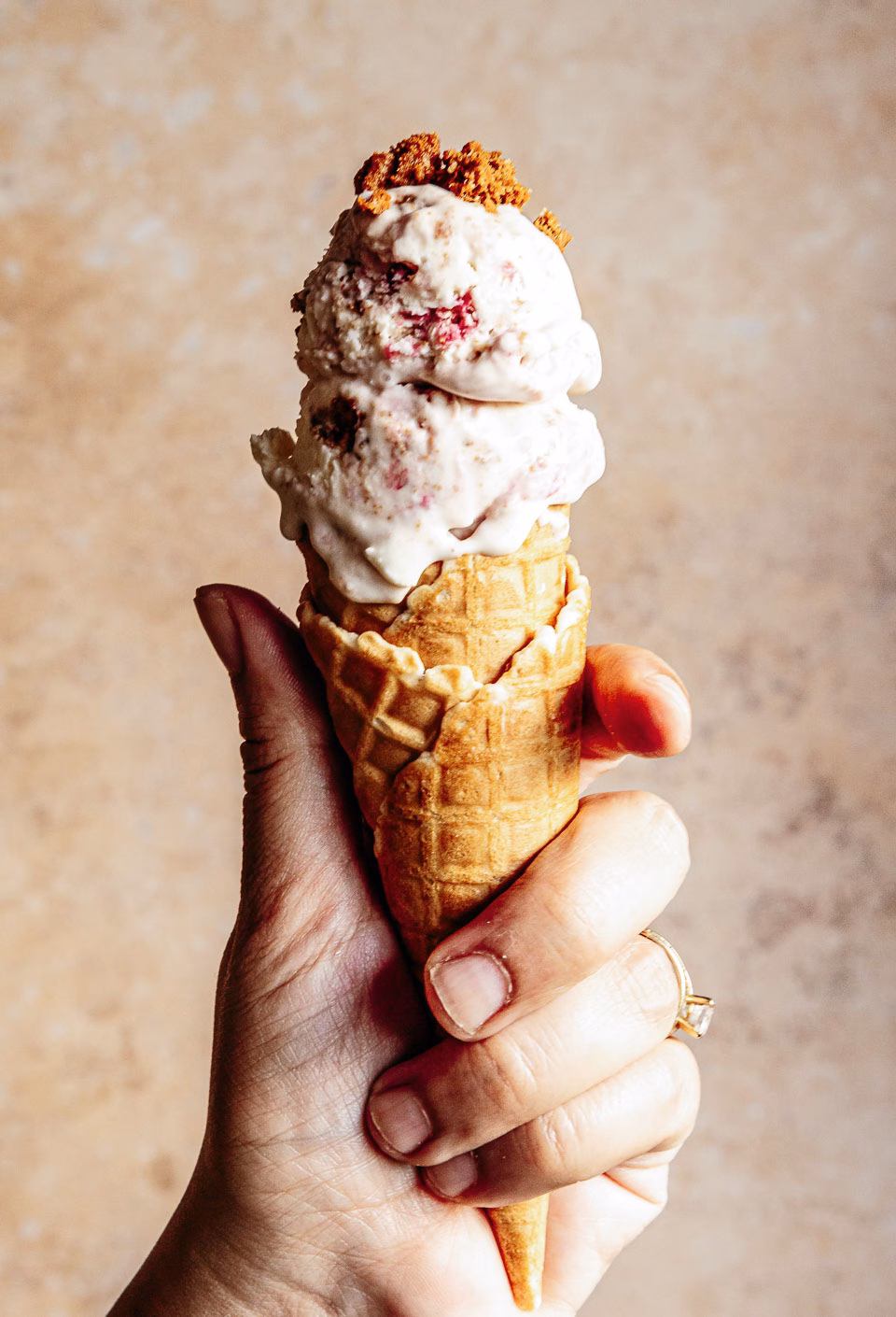 Cherry cheesecake ice cream in cone