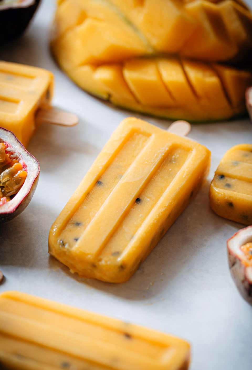 Mango and passionfruit popsicles
