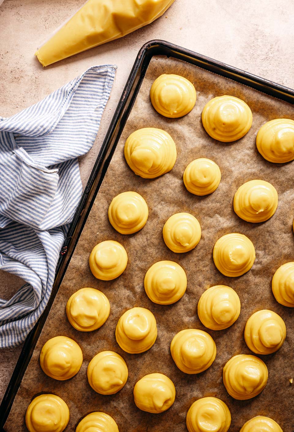 Baking tray with choux pastry